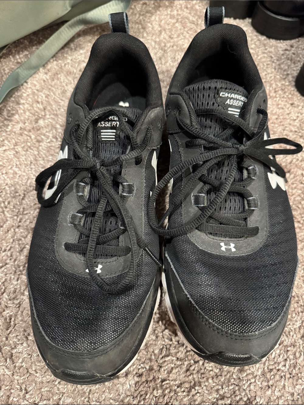 Under Armour Men’s Black and White Charged Assert Athletic Shoes